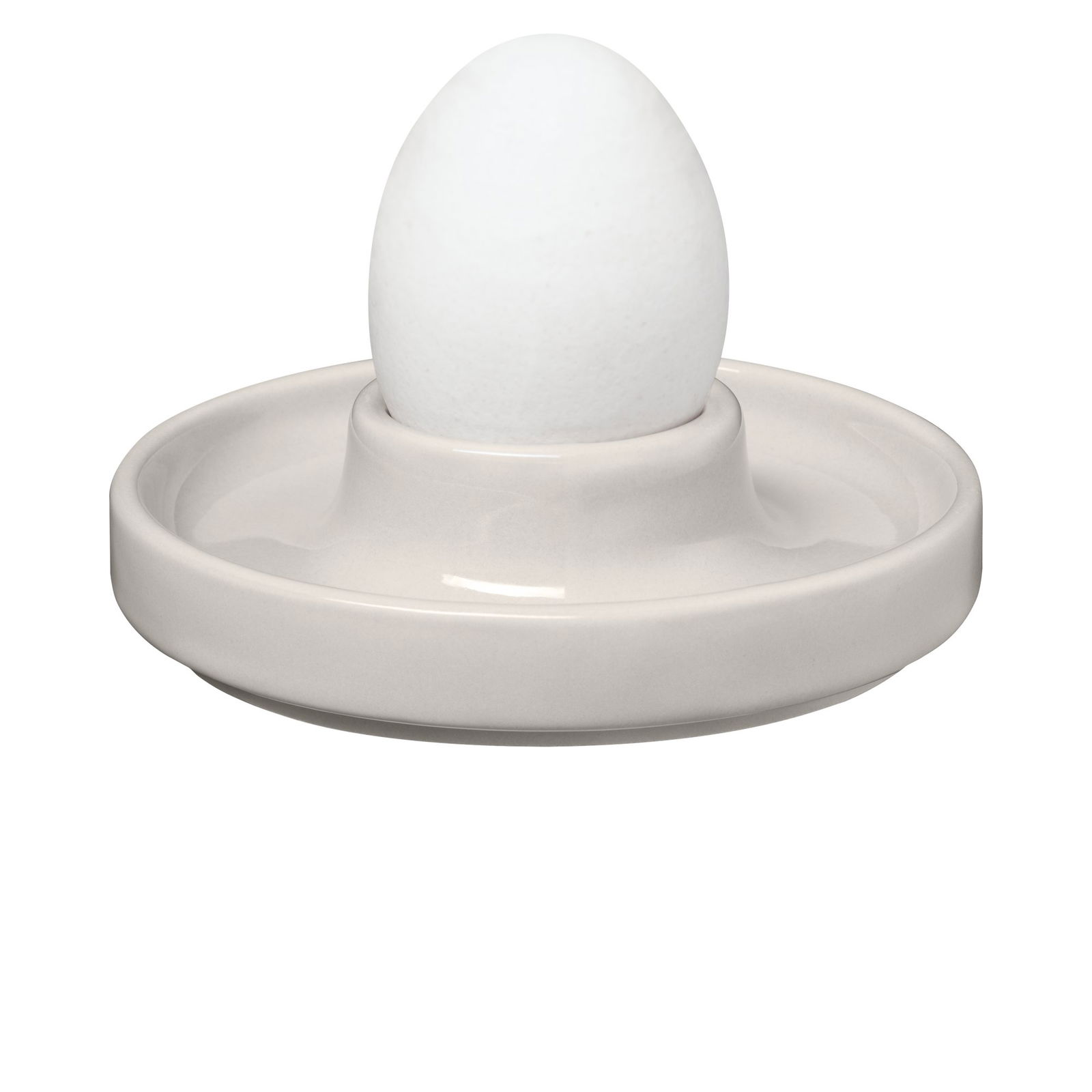 Ceramic egg cup with a white egg, perfect for serving soft-boiled eggs.