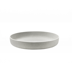 Elegant minimalist gray round plate on a black background, ideal for modern dining.