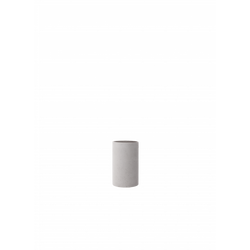 Minimalist grey concrete planter on a black background.