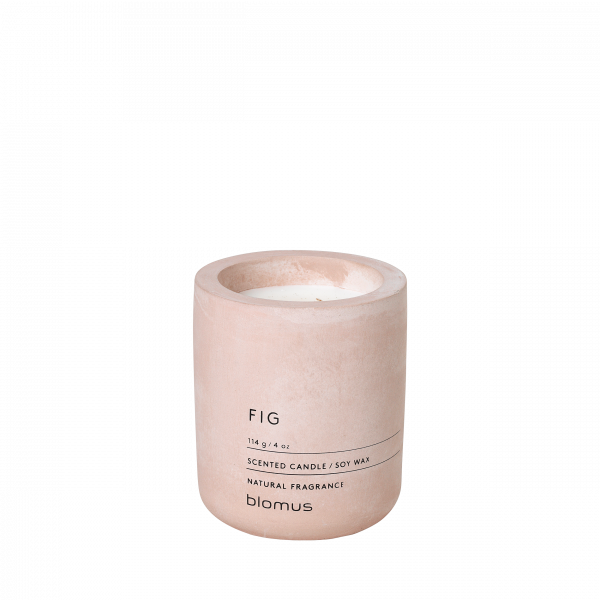 Natural fig-scented candle in a minimalist pink container from Blomus.
