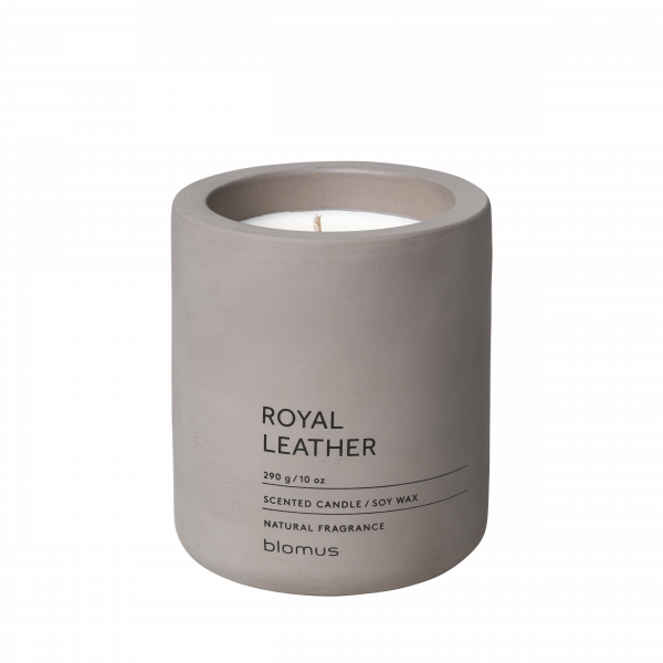 Scented soy wax candle in a minimalist concrete holder labeled Royal Leather by Blomus.