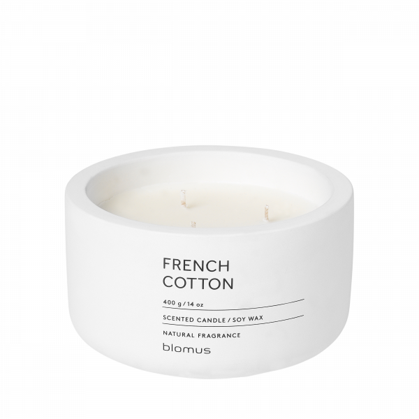 Scented candle in a white container labeled "French Cotton" for a natural fragrance experience.