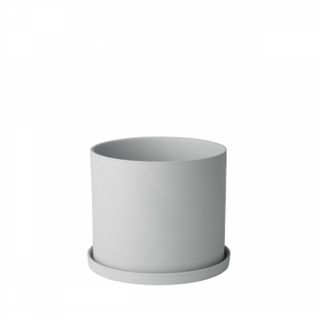 Minimalistischer weißer Keram Topf mit passender Untertasse, perfekt für Zimmerpflanzen.