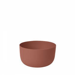 Terra-cotta bowl with a minimalist design on a plain background.