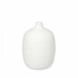 Minimalistic white ceramic vase on a black background, perfect for modern decor.
