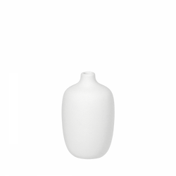 Minimalist white ceramic vase on a black background, perfect for modern decor.
