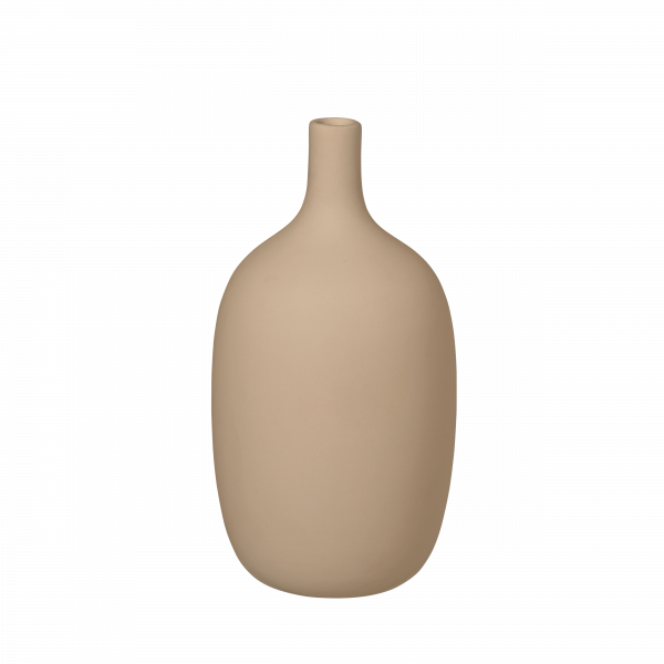 Beige ceramic vase with a smooth, modern design against a black background.