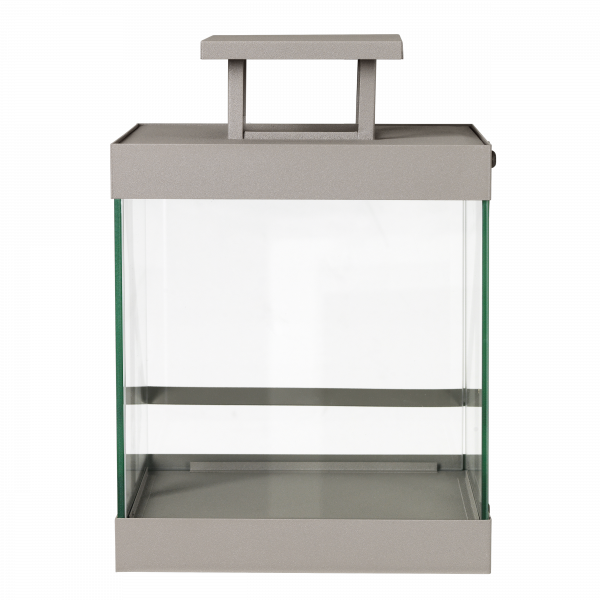 Stylish modern lantern with glass walls and a sleek metallic frame for decorative lighting.