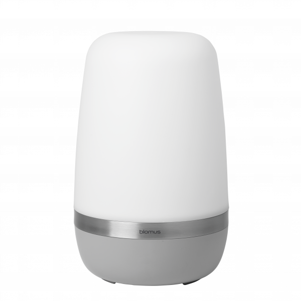 Modern Blomus lamp with a sleek white design and a metallic base, ideal for stylish decor.