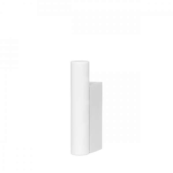 Modern minimalist white sculpture against a black background.