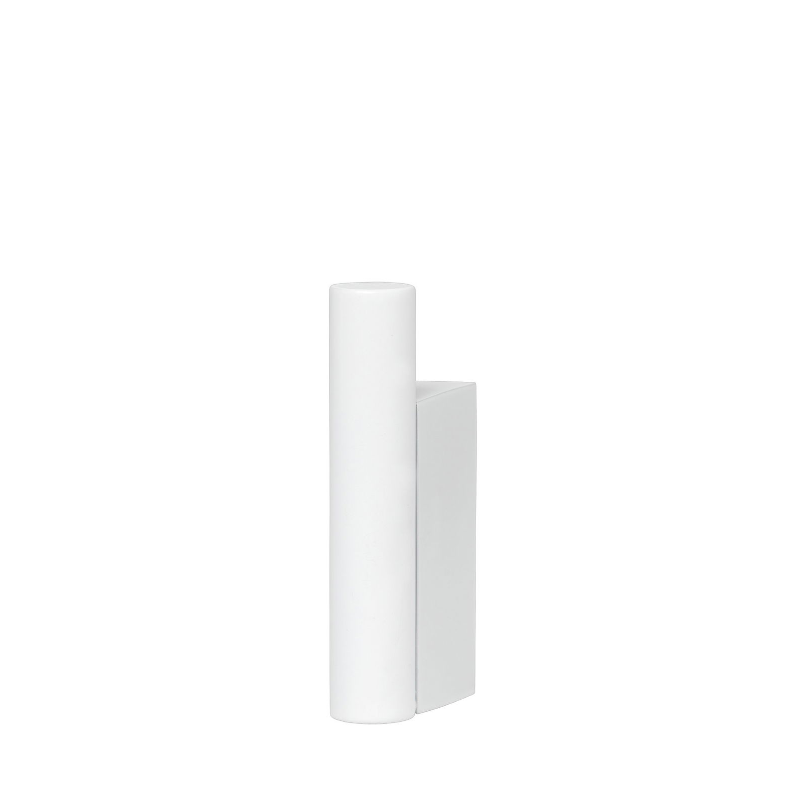 Modern minimalist white sculpture against a black background.