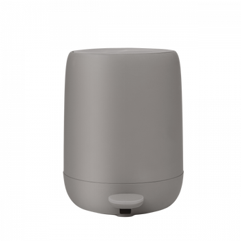 Gray essential oil diffuser with a minimalist design for aromatherapy.