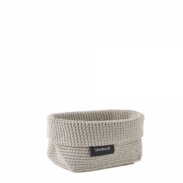"Stylish woven storage basket by Blomus, perfect for organizing home spaces."