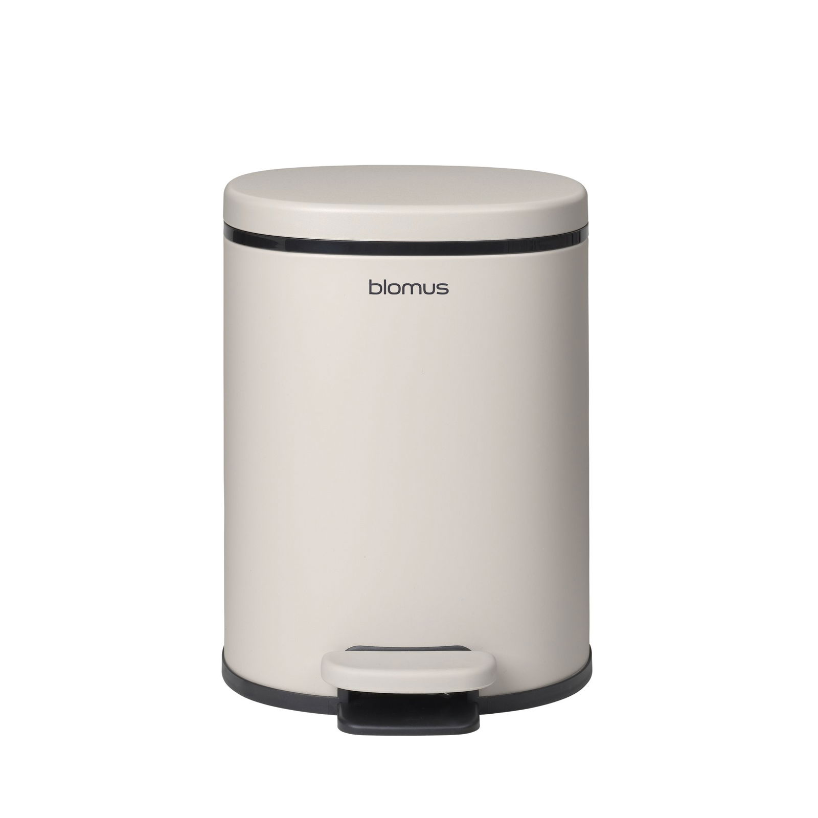 Sleek beige Blomus trash can with a foot pedal for hands-free operation.