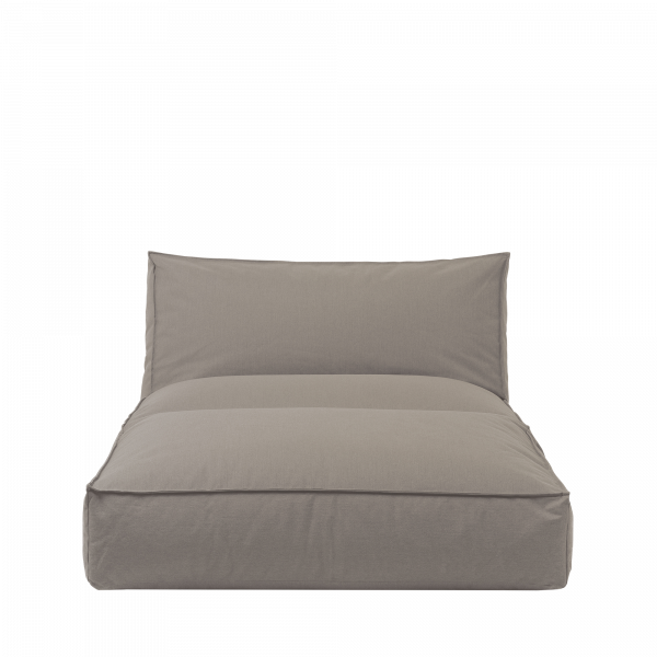 Cozy gray fabric lounge chair with a modern, minimalist design for stylish relaxation.