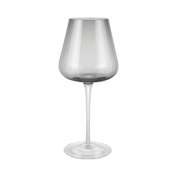 Elegant clear wine glass with a slender stem and wide bowl on a black background.