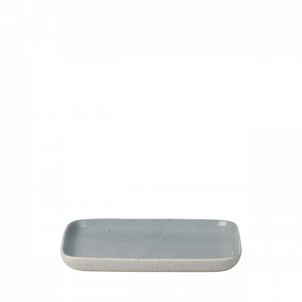 Light gray rectangular ceramic plate with a smooth surface and rounded edges.