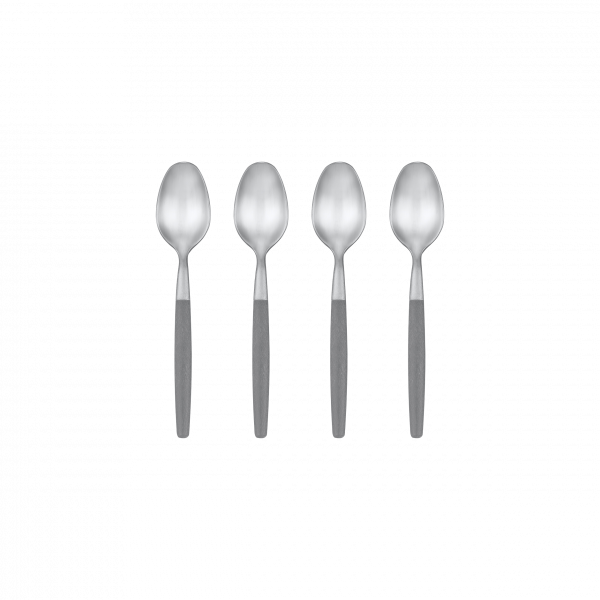 Four modern stainless steel spoons with ergonomic gray handles arranged in a row.