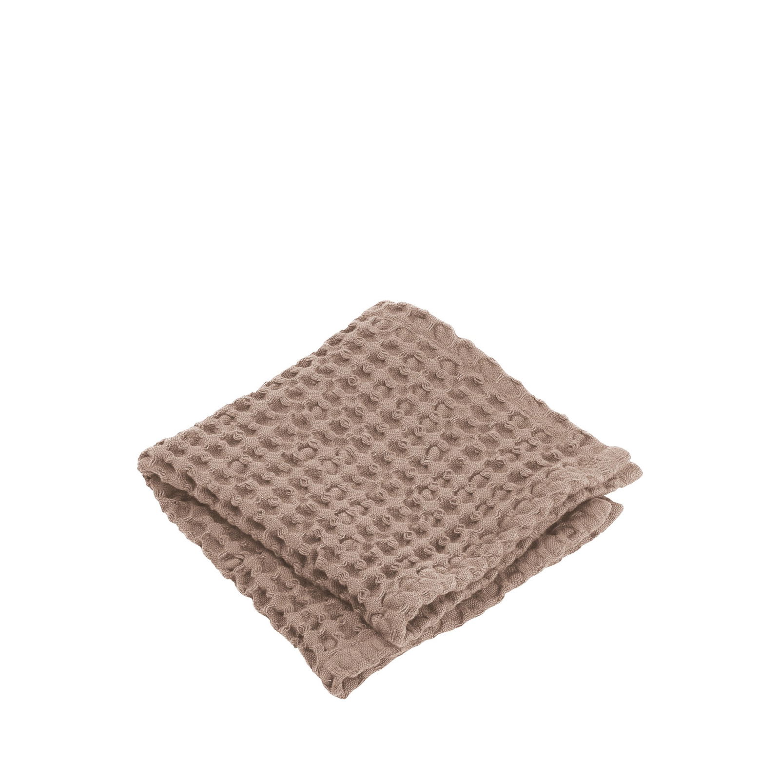 Gemütliche, strukturierte beige Decke ordentlich gefaltet für Wohnkultur und Komfort.