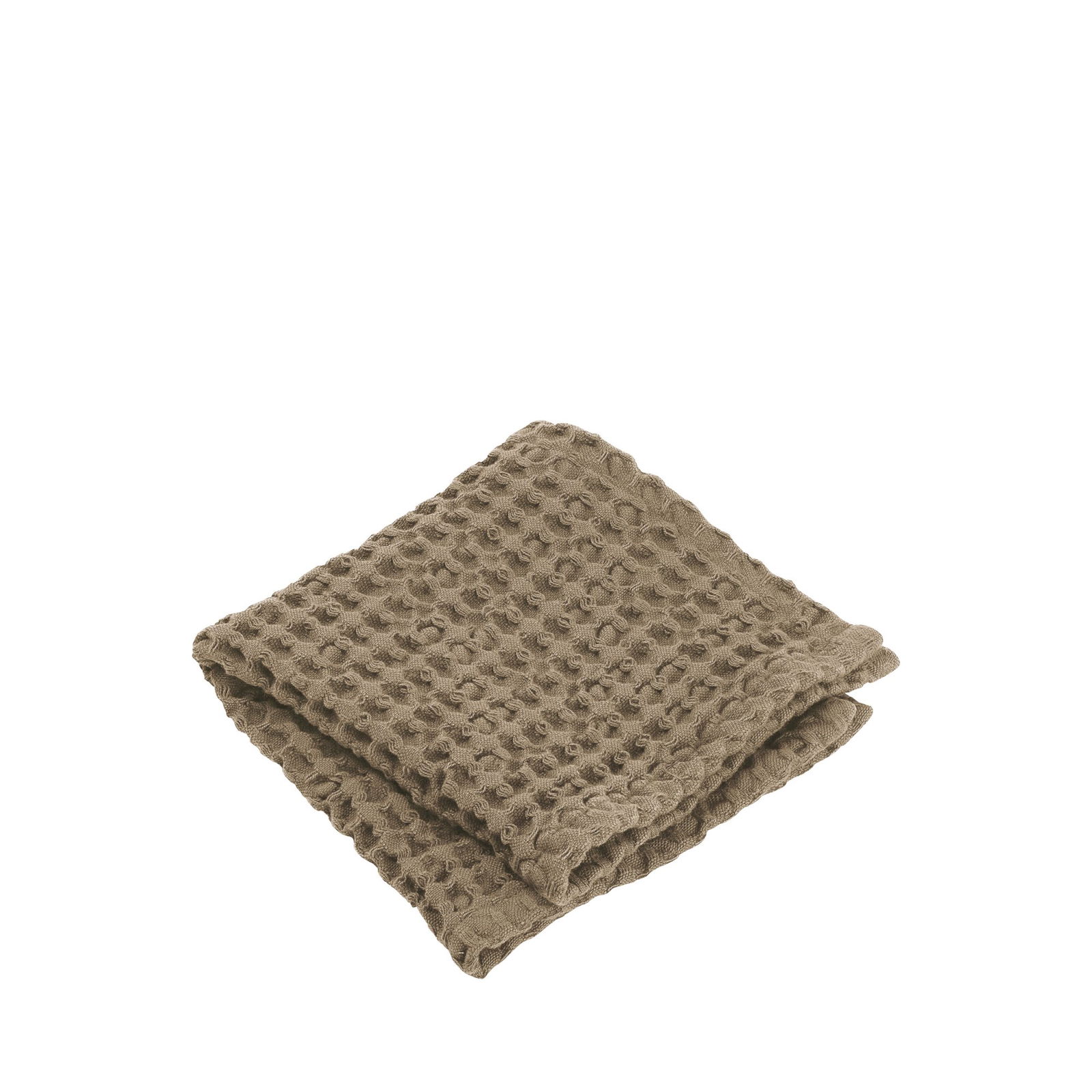 Weiche, strukturierte beige Decke ordentlich auf einem weißen Hintergrund gefaltet.
