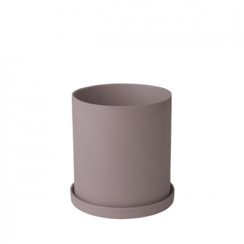 Minimalist runder rosa Pflanztopf mit einer abnehmbaren Untertasse für Zimmerpflanzen.
