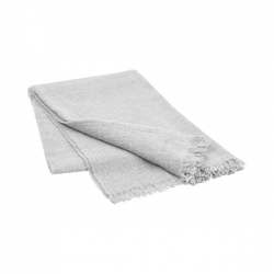 Soft gray blanket with fringed edges, perfect for home decor or cozying up.