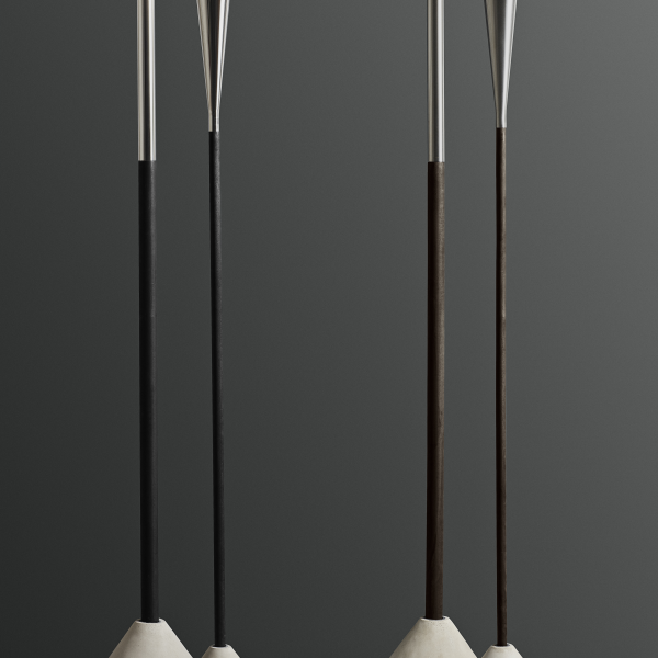 Moderne minimalistische Stehlampen mit schlanken Metallakzenten und Betonsockeln.