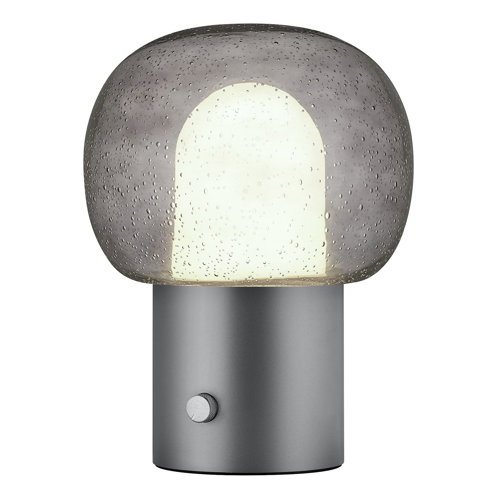 Moderne Glastischlampe mit einer strukturierten Kuppel und einem Metallfuß, der sanft warmes Licht ausstrahlt.