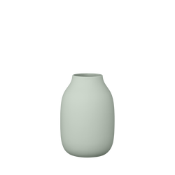 Minimalist light green vase for contemporary home decor and styling.