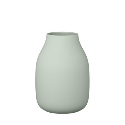 Stylish light green vase with a smooth matte finish for home decor.