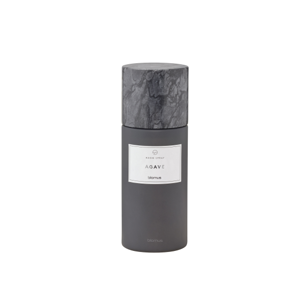 Agave scented room spray in a sleek gray bottle with a marble top design.