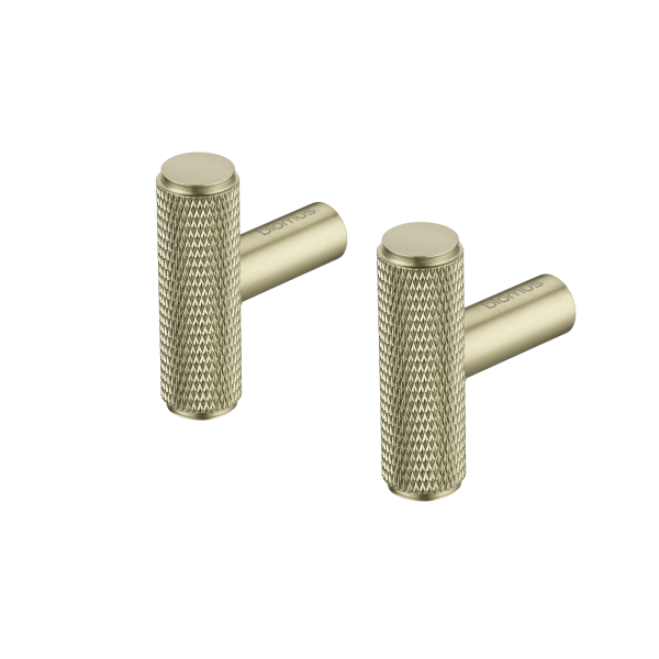 Stylische goldfarbene Metallknöpfe mit strukturiertem Griff für die Wohnkultur oder Möbel.