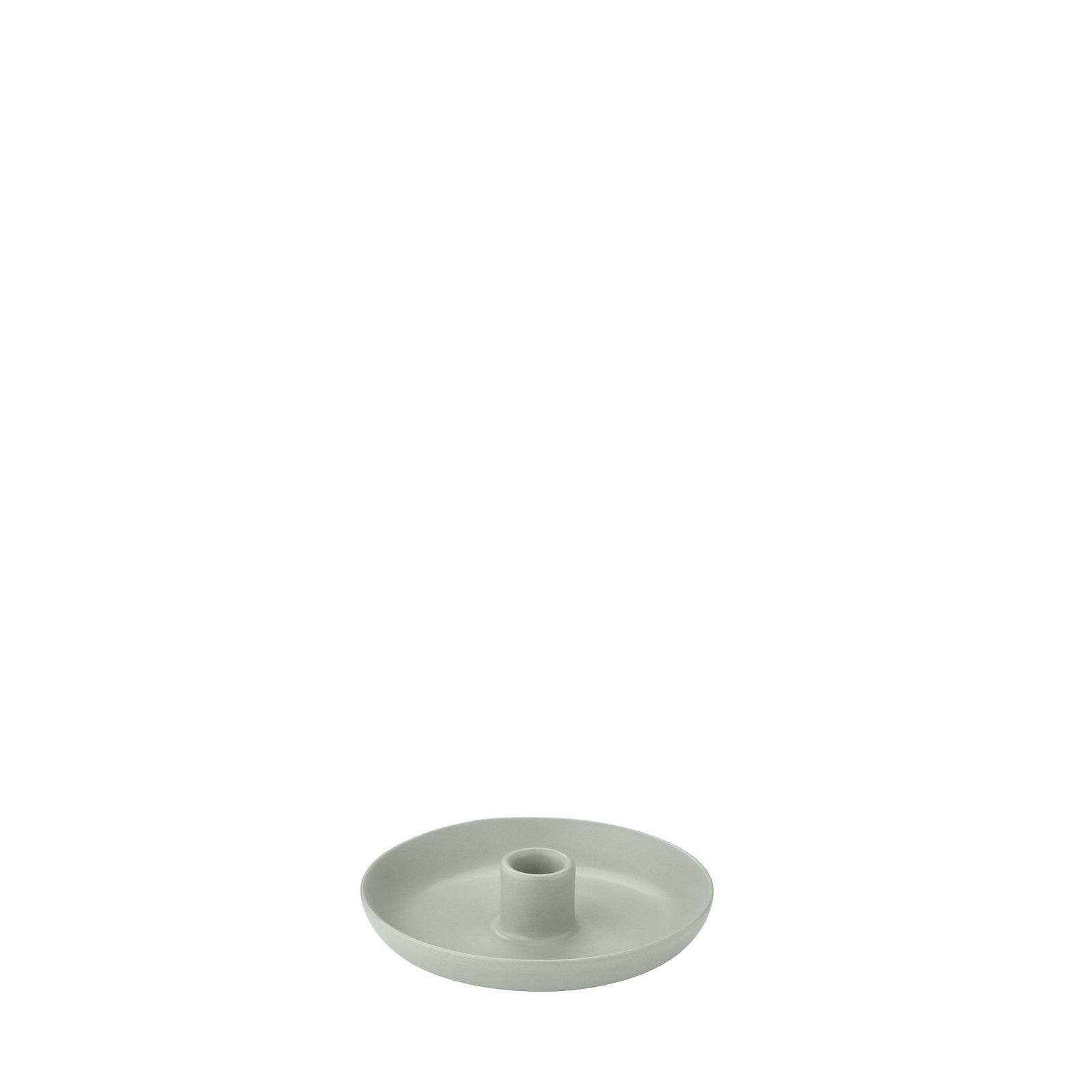 Minimalist grüner keramischer Kerzenhalter auf einem schlichten Hintergrund.