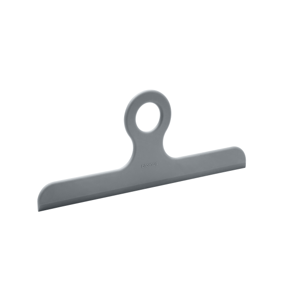 Stylish gray clip for organizing documents and materials in a modern office setting.