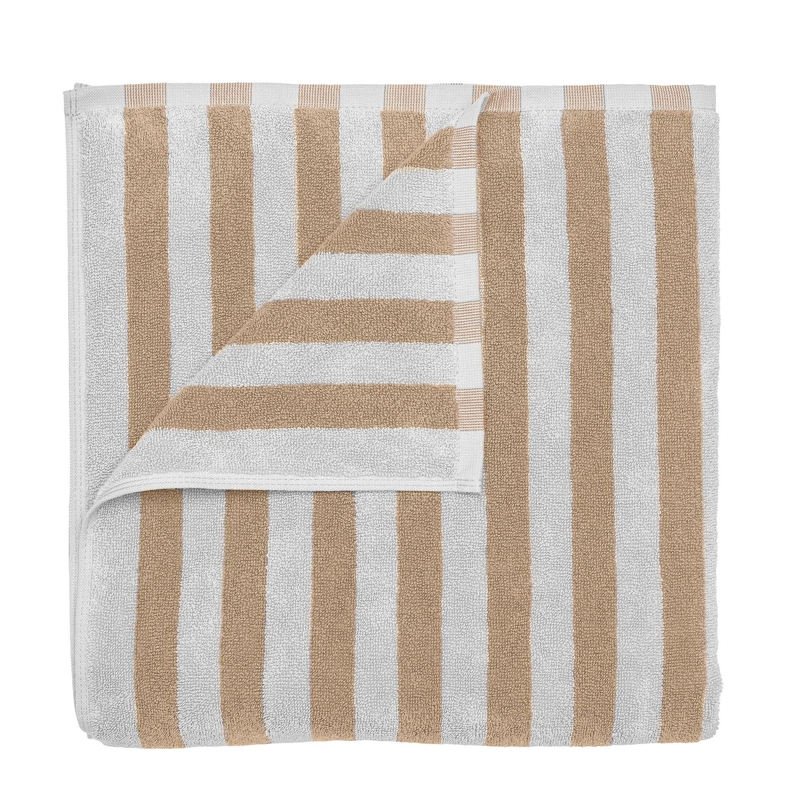 Striped beige and white towel folded neatly on a black background.