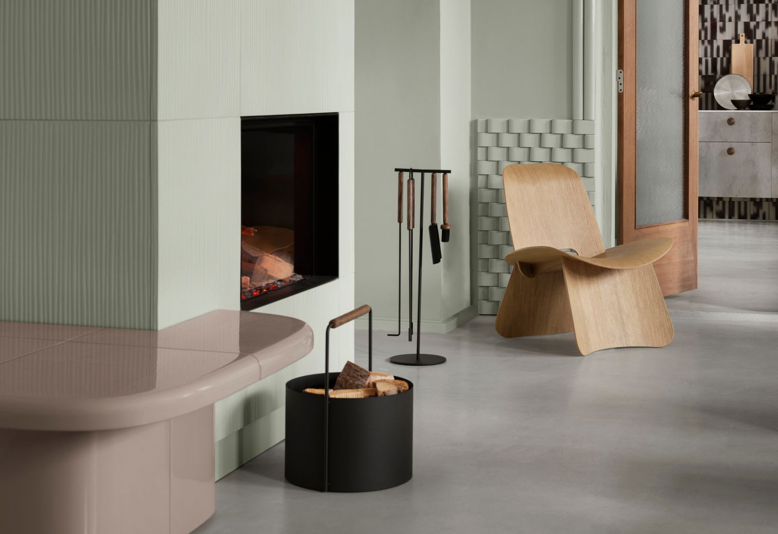 Cozy modern living room with fireplace, wood storage, and unique furniture design.