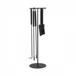 Black fireplace tool set including a brush, poker, tongs, and shovel on a stand.