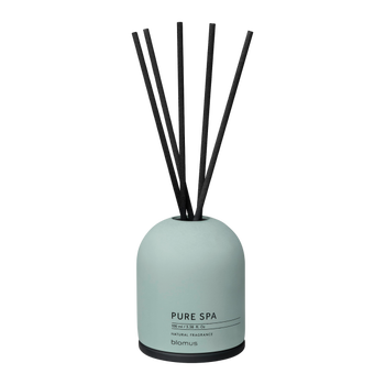 A mint green diffuser with black reeds, labeled "Pure Spa" by Blomus.