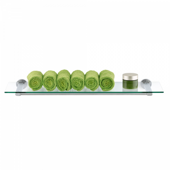 Green rolled towels and a jar on a modern glass shelf for a stylish bathroom decor.