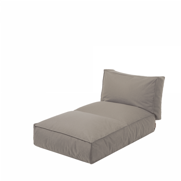 Cozy gray lounge chair with removable cushions, ideal for relaxation.