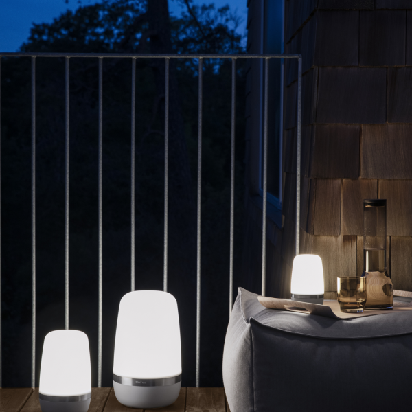 Modern outdoor lighting on a balcony creating a cozy evening ambiance.