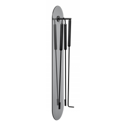 Elegant wall-mounted tool set featuring sleek black utensils for modern home decor.