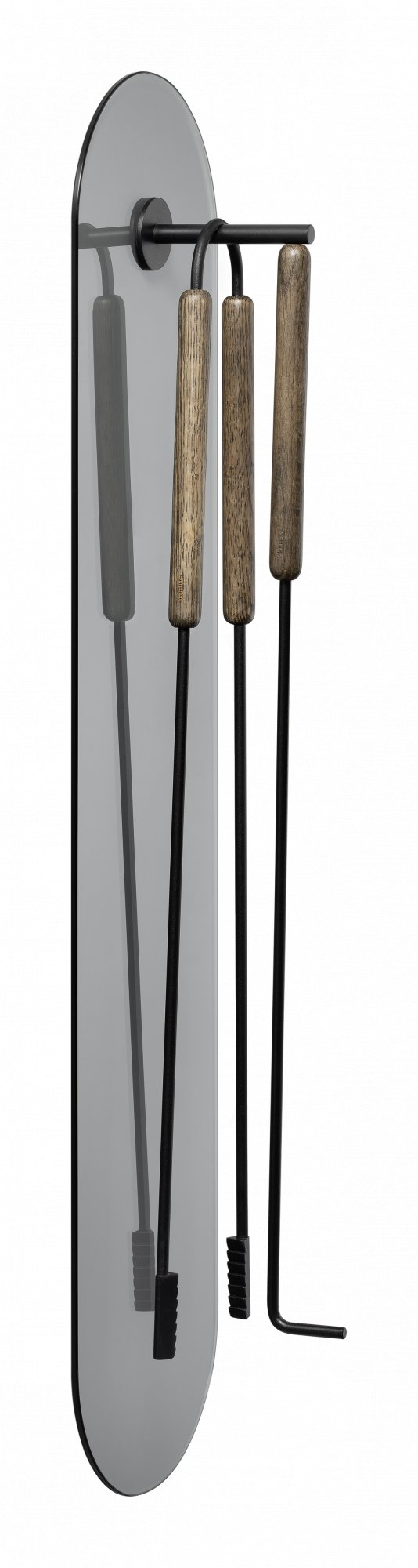 Modern fireplace tool set displayed on a sleek wall-mounted holder with wooden handles.
