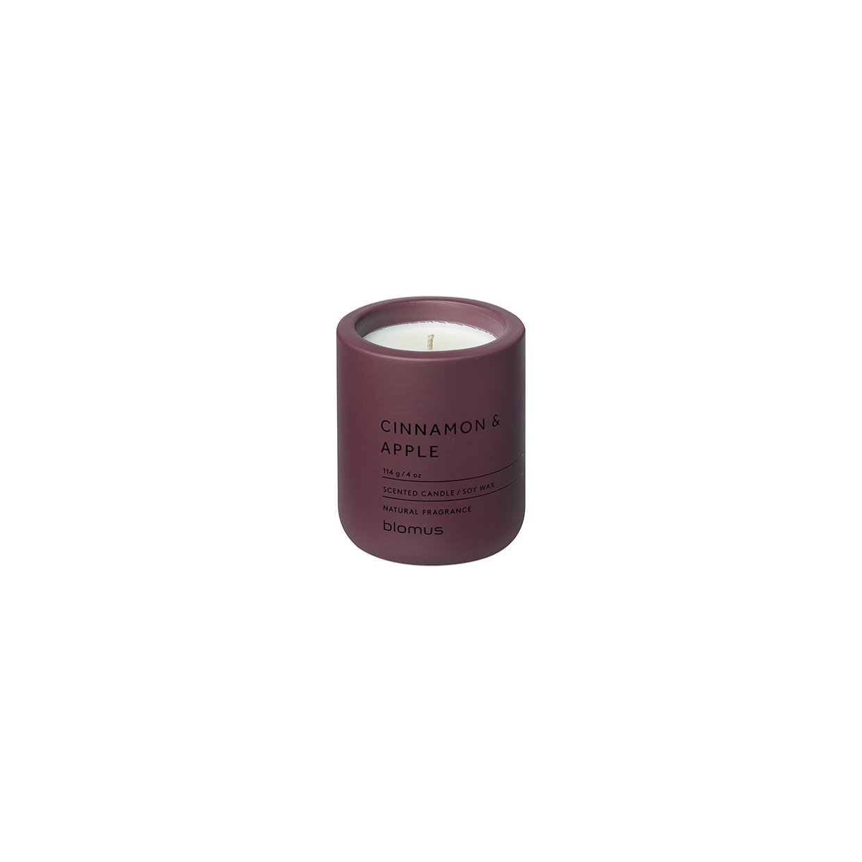 Cinnamon and apple scented candle in a burgundy container for cozy ambiance.