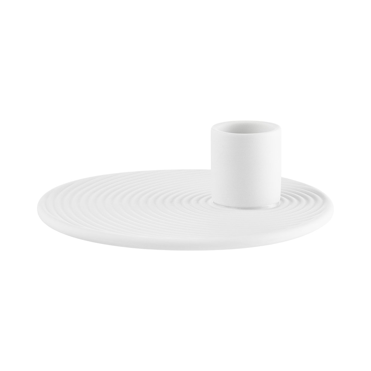White ceramic plate with a circular pattern and a matching candle holder on top.