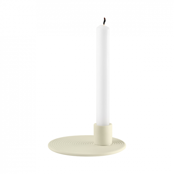 Minimalist white candle on a textured beige holder, perfect for home decor.