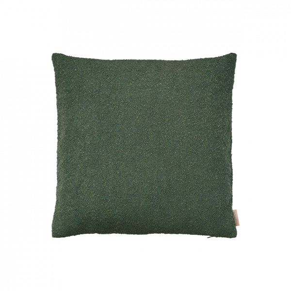Green decorative cushion for stylish home interior decor and comfort.