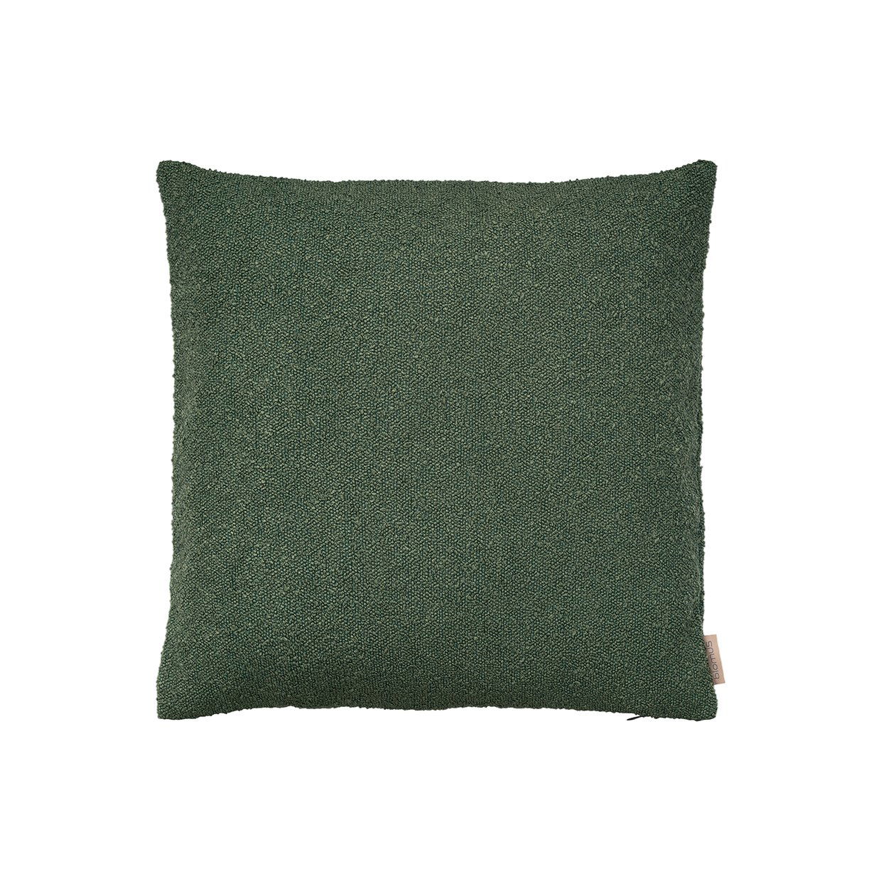 Green decorative cushion for stylish home interior decor and comfort.