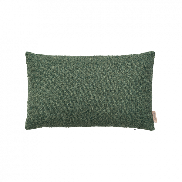 Green decorative pillow with textured fabric on a white background.