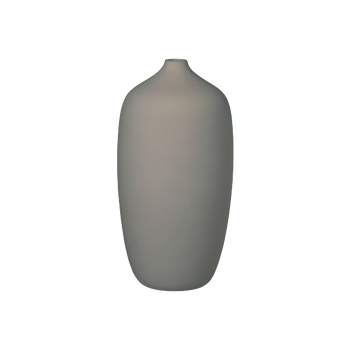 Minimalistische Keramikvase auf einem weißen Hintergrund für moderne Wohnkultur-Inspiration.